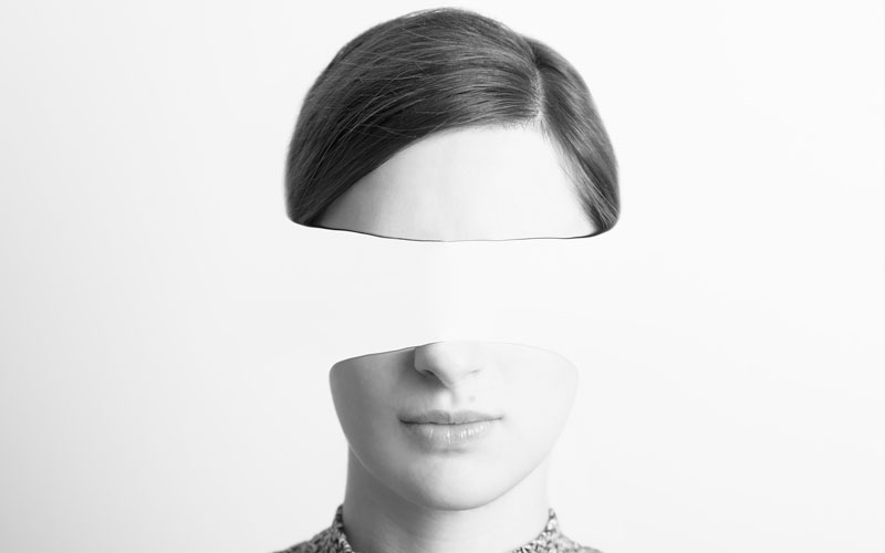 Woman with identity stripped from her face